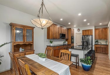 kitchen with a table and chairs and island