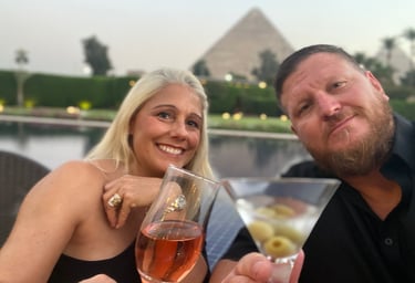 a man and woman are sitting at a table