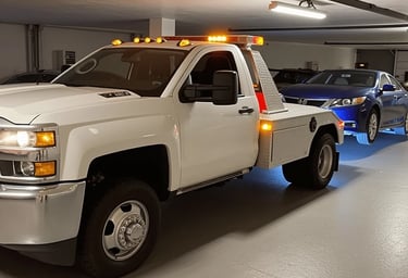 tow truck in underground parking helping disabled car