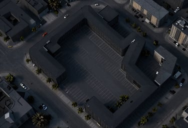 A minimalist site plan drawing showing parking and buildings in shades of black and dark gray, professional urbanization document.