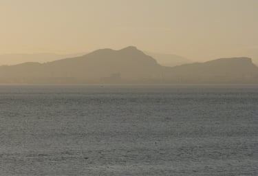 Arthur Seat and Edinburgh seen from Dalgety Bay. Lumix