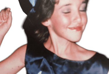 a young girl in a blue dress with a blue hat