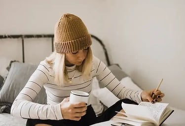 teen girl reading and making notes