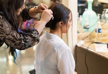 stylist doing bridal hair