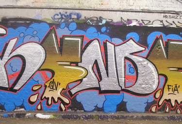 Graffiti throwup on urban surface — street writing culture European cities Kende