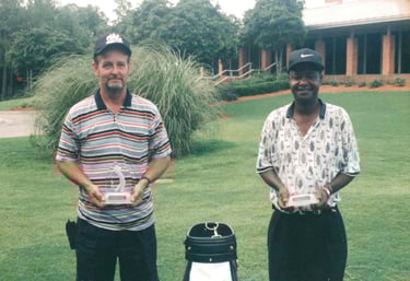 Par Four Golf Club image of two golf winners