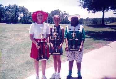 Par Four Golf Club image of three women golfers winners