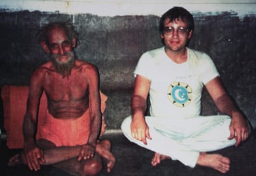 a man sitting on the floor with a beardless man