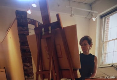 Sandra Forzani painting in her studio