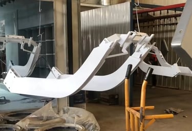 Sand blasting process to clean and prepare strength equipment surfaces