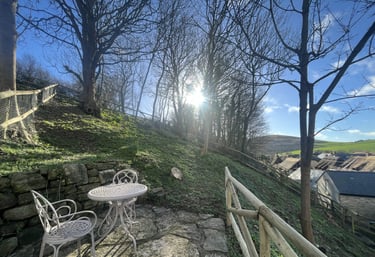 a garden from a holiday cottage overlooking west lulworth village
