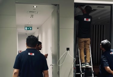 A group of people maintaining a bank's systems