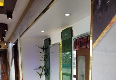 a bathroom with two sinks and a mirror