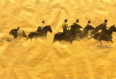 Gold and Platinum photo of a group of people riding horses in the sea