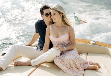 lindsay brewer and drew solomon engagement session on a boat in Lake Como