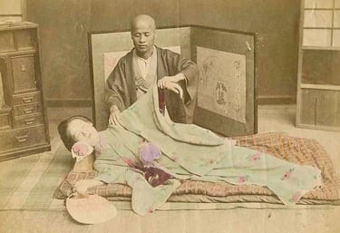 Séance de Shiatsu sur futon (photo historique Japon)