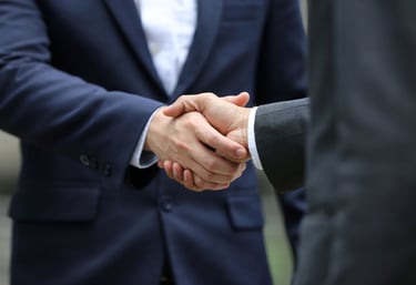 2 senior executive shaking hands