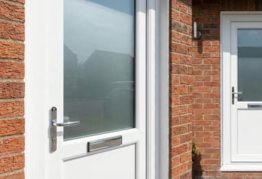 a white door with a white door and a white door