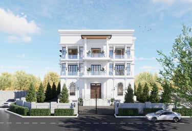 a large white colonial building with a car parked in front of it