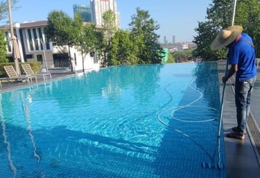 Crystal-clear swimming pool cleaning by TOT Cleaning & Landscape Sdn Bhd.