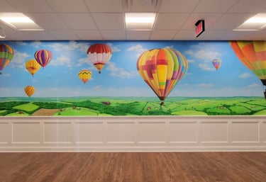 bespoke mural of hot air balloons by marcine for a residential adult facility in warrren, nj