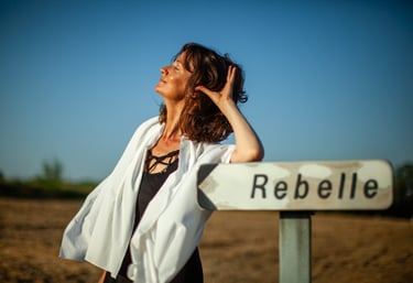 a rebel woman in a white robe