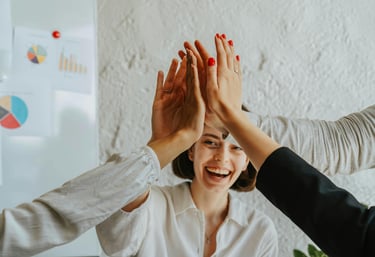 High five for successful Kaizen team