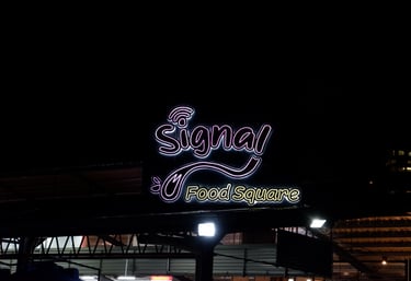 a neon sign for Signal Food Square Logo by GlobalKitc KPD Avenue Kota Kinabalu