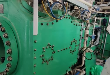 Reciprocating gas compressor
