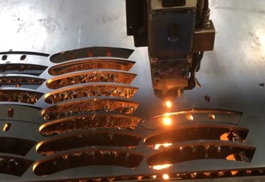 Laser cutting process used to fabricate precision components for strength machines