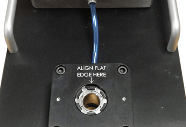 Vacuum metrology fixture for holding a soft rubber medical dome