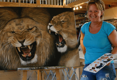 Mireille Desroches and her lions