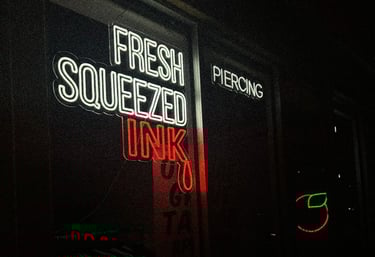 Exterior front window display at Orange Grove Tattoo