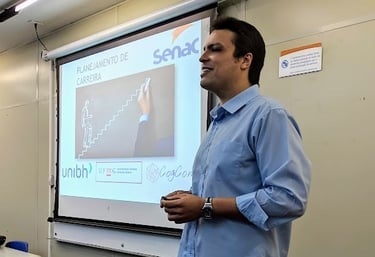 a man standing in front of a presentation screen