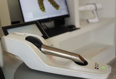 a computer monitor and a laptop on a desk