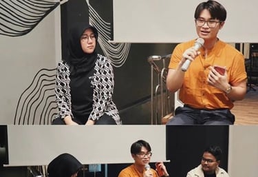 a man and woman sitting on a stage
