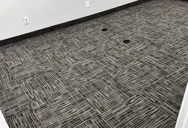 Grey commercial carpet tile installed in conference room in Downtown London Ontario, durable flooring solution