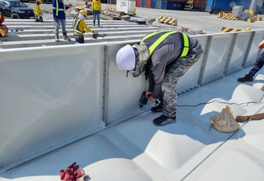 GRP Sectional Water Tank Side Panel Installation from above the Bottom Panel