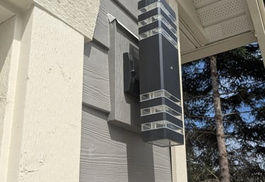 Siding and exterior light with weatherproof sealing and careful trim painting
