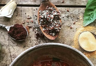 dry spices and dry garlic on a wooden table