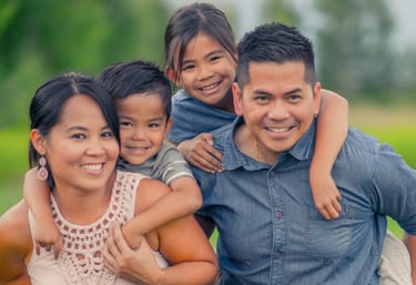 a family of three children posing for a picture