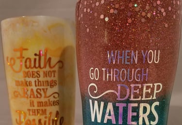 two metal tumblers decorated with faith statements
