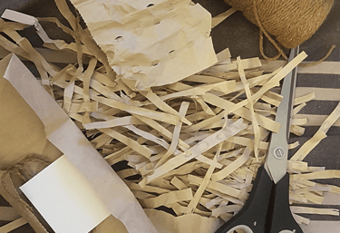 a pair of scissors and a pair of scissors on a table