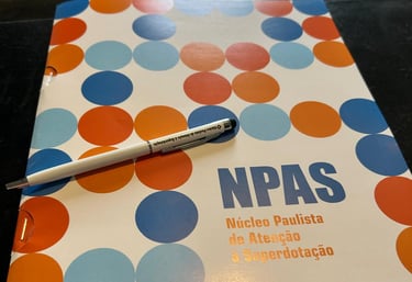 a pen and pen on a notebook with a pen