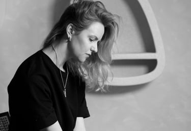 a woman sitting on a chair in a chair