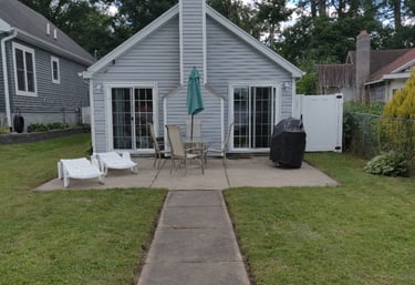 rear of cottage relax lakeside lake views southern michigan vrbo airbnb dock short term rental