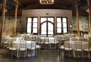 Reception room with Chiavari Chairs - The rented event