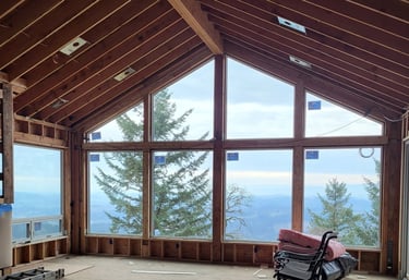 great room addition with a window wall