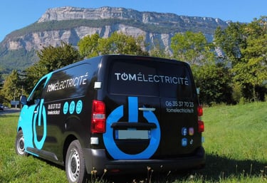 a van with a blue and white sign on it