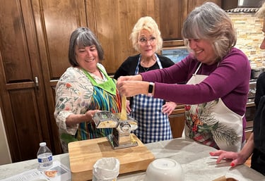People having fun during pasta class